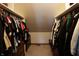 Spacious walk-in closet with hanging racks and shelving at 9903 E Raymond St, Indianapolis, IN 46239