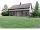 Charming brick home with a well-manicured lawn and inviting front entrance at 9903 E Raymond St, Indianapolis, IN 46239