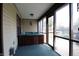 Sunroom with screened windows and a hot tub at 9903 E Raymond St, Indianapolis, IN 46239