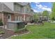 A tranquil backyard featuring a hot tub, fire pit, and a gazebo for relaxing or entertaining guests at 9950 Sugarleaf Pl, Fishers, IN 46038