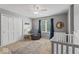 Serene Bedroom with a crib, glider, and plenty of natural light, creating a calming space at 9950 Sugarleaf Pl, Fishers, IN 46038