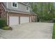 A well maintained home with an attached two car garage and additional parking with a basketball hoop at 9950 Sugarleaf Pl, Fishers, IN 46038