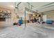 The two car garage has ample room for parking and storage with overhead lighting included at 9950 Sugarleaf Pl, Fishers, IN 46038