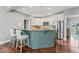 Charming kitchen with granite countertops, eat-in bar, stainless steel appliances, and wood floors at 9950 Sugarleaf Pl, Fishers, IN 46038
