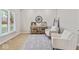 Bright living room featuring neutral tones, a console table, and lots of natural light at 9950 Sugarleaf Pl, Fishers, IN 46038