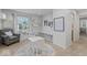 A bright playroom features natural light, a white table and chairs and storage at 9950 Sugarleaf Pl, Fishers, IN 46038