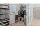 Walk-in closet with built-in shelving and lots of storage space at 9950 Sugarleaf Pl, Fishers, IN 46038