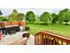 Tranquil backyard featuring a hot tub, patio, and natural landscaping, offering a private retreat at 998 Cass Dr, Franklin, IN 46131