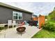 Backyard patio area featuring a hot tub, outdoor seating, and a fire pit, perfect for relaxation and entertainment at 998 Cass Dr, Franklin, IN 46131