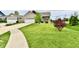 Beautiful home featuring a well-maintained lawn and a two-car garage, surrounded by lush greenery at 998 Cass Dr, Franklin, IN 46131