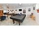 Game room with a pool table and tables for additional entertainment and dining at 998 Cass Dr, Franklin, IN 46131