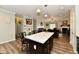 Open concept kitchen features a center island with seating and is open to the living room at 998 Cass Dr, Franklin, IN 46131