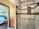 Modern bathroom featuring a glass-enclosed shower with decorative tile accents at 1026 Jackson St, Columbus, IN 47201