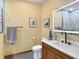 Bathroom with modern vanity and elegant tile accents, creating a serene and stylish space to unwind and refresh at 1026 Jackson St, Columbus, IN 47201