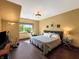 Comfortable bedroom with wood floors, a large window, and a neutral color palette at 1026 Jackson St, Columbus, IN 47201