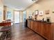 Hallway area featuring hardwood floors and a long counter top and cabinets at 1026 Jackson St, Columbus, IN 47201