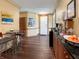 A bright interior with hardwood floors, tan walls, and modern decor. A stylish space perfect for urban living at 1026 Jackson St, Columbus, IN 47201