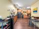 Open kitchen featuring hardwood floors, stainless steel appliances, and ample counter space at 1026 Jackson St, Columbus, IN 47201