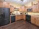 Modern kitchen with hardwood floors, updated appliances, and plenty of cabinet space at 1026 Jackson St, Columbus, IN 47201
