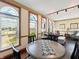 Bright living area with hardwood floors, large windows, and comfortable seating at 1026 Jackson St, Columbus, IN 47201