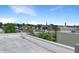 Wide rooftop deck with neighborhood views and an inviting sky at 1026 Jackson St, Columbus, IN 47201