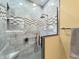 Luxurious shower with stylish tile and modern fixtures, creating a spa-like retreat for relaxation and rejuvenation at 1026 Jackson St, Columbus, IN 47201