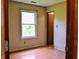 Bedroom with light-colored walls and wood-look flooring, bright window at 107 Camelia Ct, Mooresville, IN 46158