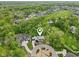 An aerial view showcasing the property's location near a golf course and upscale neighborhood at 11064 Hamilton Run, Zionsville, IN 46077