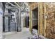 Unfinished basement with exposed utilities and storage area at 11064 Hamilton Run, Zionsville, IN 46077
