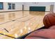 Spacious indoor basketball court with hardwood floors, perfect for a game of hoops at 11064 Hamilton Run, Zionsville, IN 46077