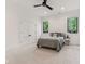 Bedroom with neutral tones, plush carpet, and a ceiling fan for added comfort at 11064 Hamilton Run, Zionsville, IN 46077