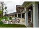 Inviting outdoor patio with comfortable seating and a cozy fire pit, ideal for entertaining guests at 11064 Hamilton Run, Zionsville, IN 46077