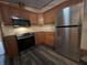 Modern kitchen featuring stainless steel appliances and beautiful cabinetry at 117 Fountain Lake Dr, Greenfield, IN 46140