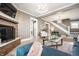 Elegant living room features a cozy fireplace, plush furniture, and modern lighting, creating a warm atmosphere at 1205 N Oxford St, Indianapolis, IN 46201