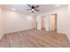 Bright bedroom featuring sleek ceiling fan, natural light, and ensuite bathroom access at 1491 Coen Ct, Columbus, IN 47201