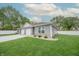 Charming home with a well-manicured lawn, gray siding, and a two-car garage, complete with tasteful landscaping at 1491 Coen Ct, Columbus, IN 47201