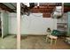 Unfinished basement space with concrete flooring and exposed ceiling beams at 1507 N Luett Ave, Indianapolis, IN 46222