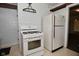 Kitchen space featuring standard appliances, and a vintage look at 1507 N Luett Ave, Indianapolis, IN 46222