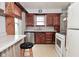 A rustic kitchen with ample counter space and natural light from the window at 1507 N Luett Ave, Indianapolis, IN 46222