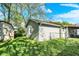 View of the backyard showcasing a storage shed and a fenced-in lawn at 1523 E Perry St, Indianapolis, IN 46227