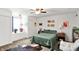 Cozy bedroom with a queen bed, neutral decor, and a comfortable atmosphere at 1523 E Perry St, Indianapolis, IN 46227