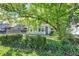 Charming single-story home with fenced-in yard and quaint sunroom at 1523 E Perry St, Indianapolis, IN 46227