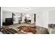 Cozy living room with neutral colors, plush carpeting, and decor that creates a warm and inviting atmosphere at 1523 E Perry St, Indianapolis, IN 46227