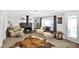 Inviting living area with fireplace, comfortable seating, large windows, and a stylish accent rug at 1523 E Perry St, Indianapolis, IN 46227