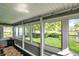 The sunroom provides a cozy place to relax and enjoy the sunlight at 1523 E Perry St, Indianapolis, IN 46227