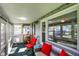 The sunroom provides a cozy place to relax and enjoy the sunlight at 1523 E Perry St, Indianapolis, IN 46227