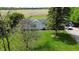 Aerial view of the home, showcasing its location, expansive yard, and driveway parking at 1683 W County Road 300 S, Danville, IN 46122