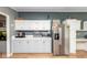 Eat-in kitchen featuring sleek appliances, ample counter space, and stylish design elements at 1683 W County Road 300 S, Danville, IN 46122