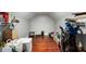 Spacious attic area with hardwood floors, storage shelves and ample room for organization at 1808 E 11Th St, Indianapolis, IN 46201
