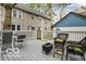 Spacious deck featuring dining set and wicker furniture perfect for outdoor entertaining at 1808 E 11Th St, Indianapolis, IN 46201